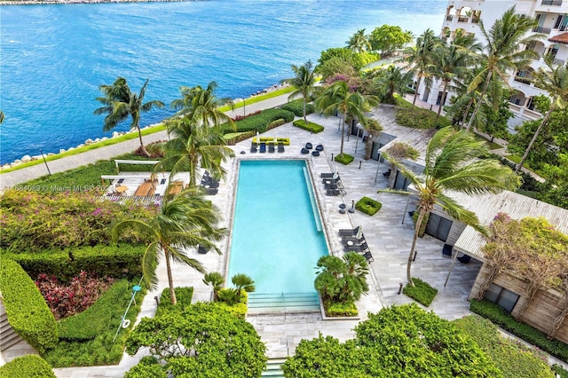 birds eye view of property featuring a water view