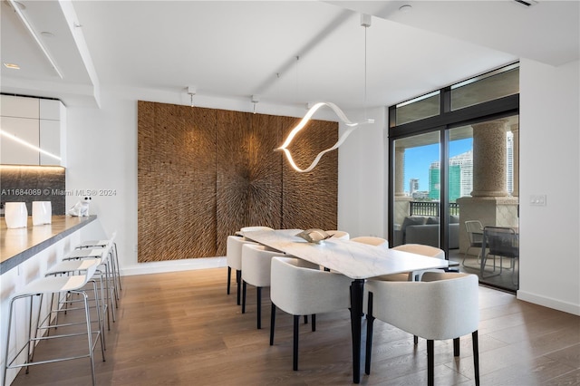 7065 Fisher Island Dr Unit 7065, Miami Beach, FL 33109 - dining room with wood finished floors and baseboards