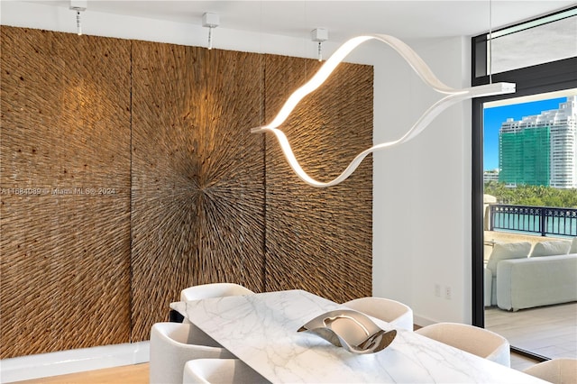 dining room with light wood-type flooring