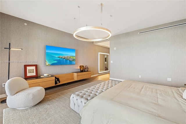 bedroom featuring hardwood / wood-style floors