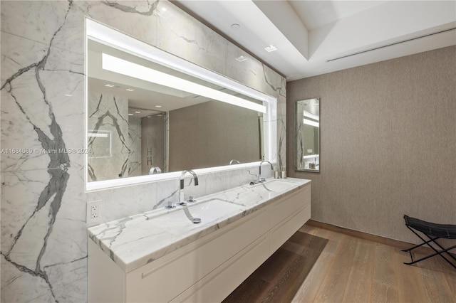 bathroom featuring vanity and hardwood / wood-style flooring