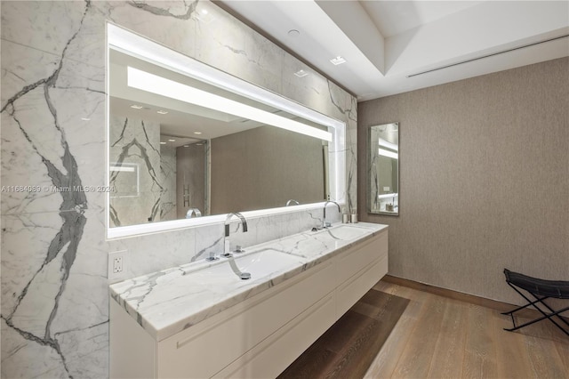 7065 Fisher Island Dr Unit 7065, Miami Beach, FL 33109 - bathroom with wood finished floors and double vanity