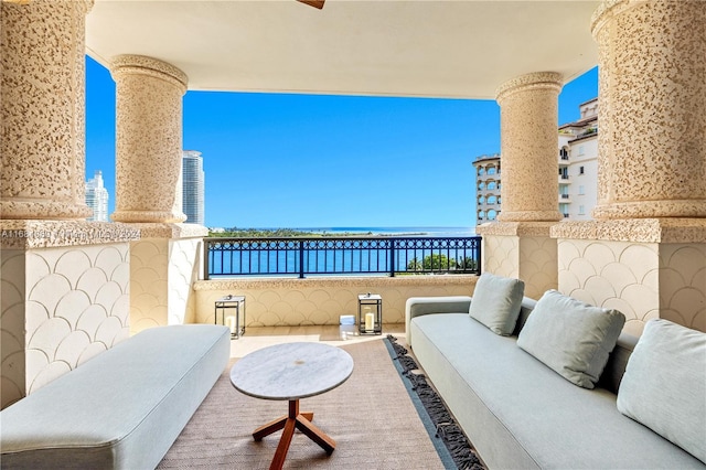 7065 Fisher Island Dr Unit 7065, Miami Beach, FL 33109 - view of patio / terrace featuring a balcony and a water view