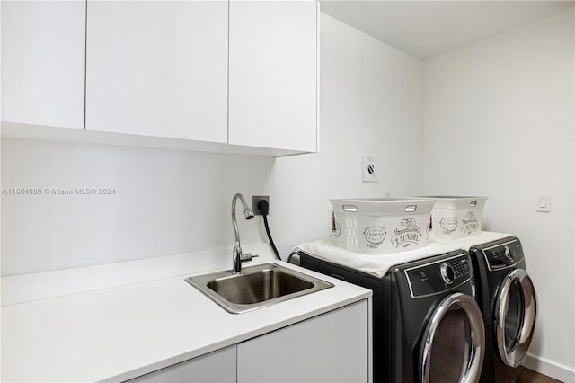 7065 Fisher Island Dr Unit 7065, Miami Beach, FL 33109 - clothes washing area with cabinet space and washer and dryer