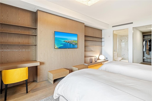 7065 Fisher Island Dr Unit 7065, Miami Beach, FL 33109 - bedroom with wood finished floors and connected bathroom