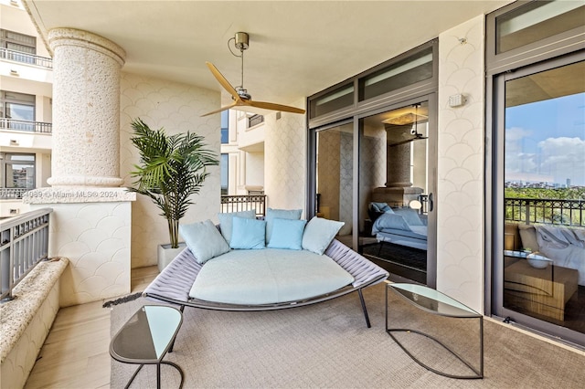 balcony featuring ceiling fan