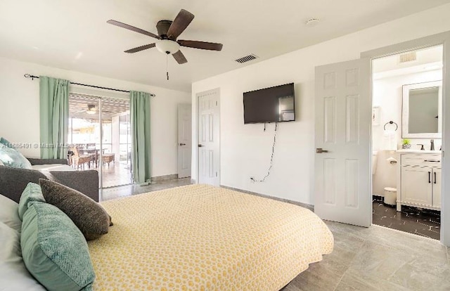 bedroom with ensuite bath and ceiling fan