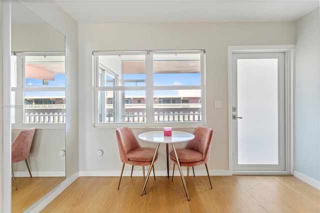180 NE 12th Ave Unit 12E, Hallandale Beach, FL 33009 - dining room with wood finished floors and baseboards