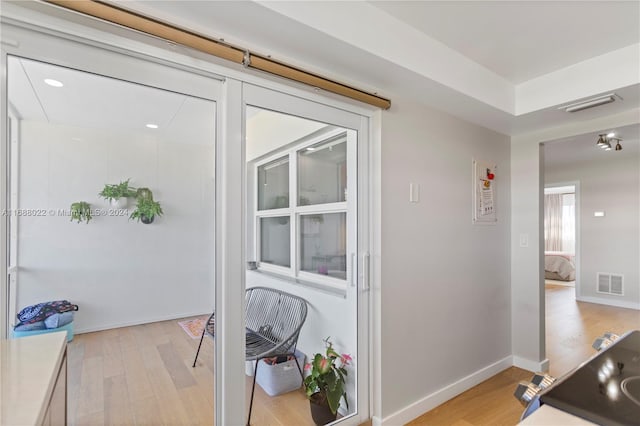 180 NE 12th Ave Unit 12E, Hallandale Beach, FL 33009 - hall with light wood finished floors and baseboards