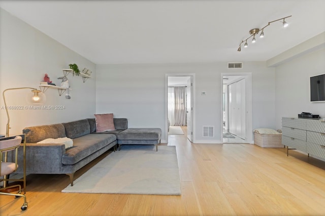 180 NE 12th Ave Unit 12E, Hallandale Beach, FL 33009 - living area featuring wood finished floors