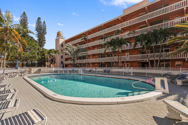 180 NE 12th Ave Unit 12E, Hallandale Beach, FL 33009 - community pool featuring a patio area