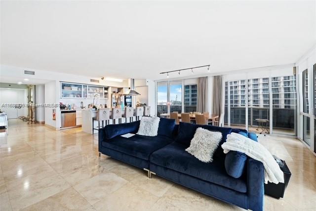 living room featuring track lighting