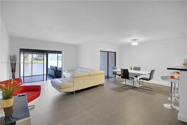 living room with light tile patterned floors