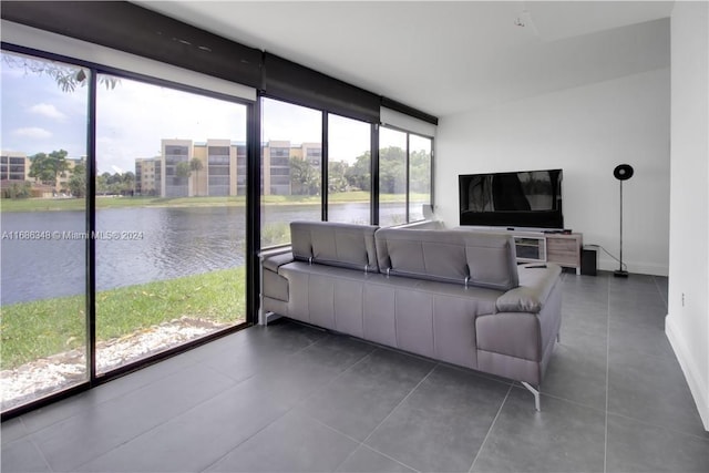 unfurnished living room featuring dark tile patterned flooring