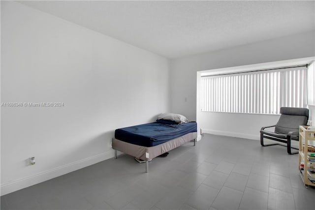 bedroom with a textured ceiling