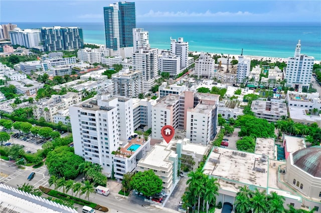 drone / aerial view with a water view