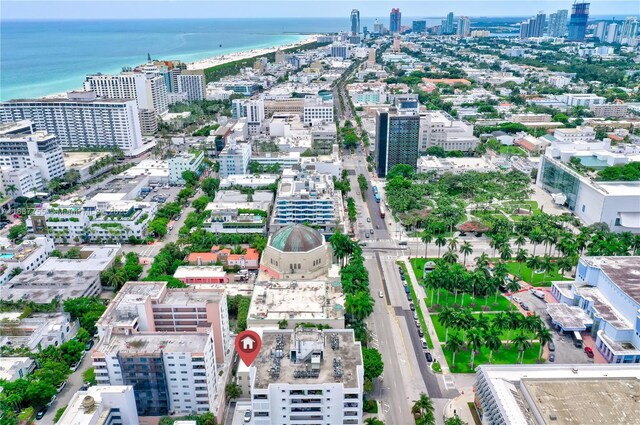 bird's eye view with a water view