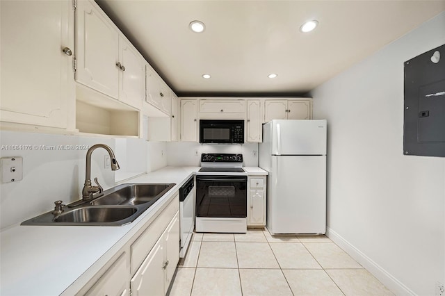 kitchen with electric panel, white cabinets, sink, light tile patterned flooring, and white appliances