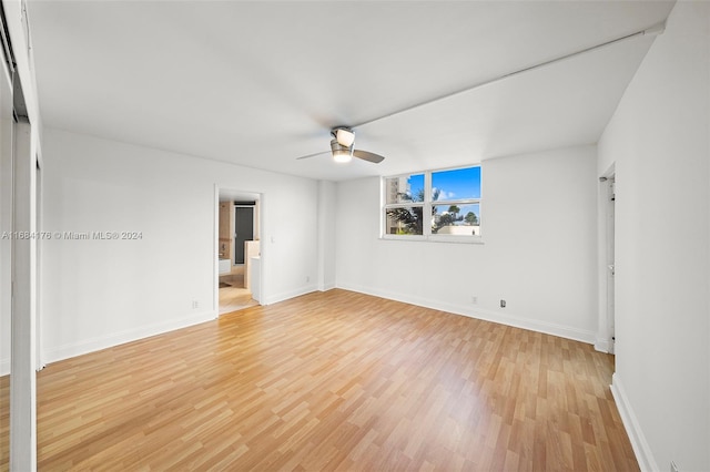 unfurnished room with light hardwood / wood-style floors and ceiling fan