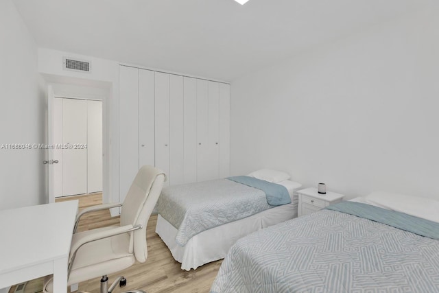 bedroom featuring light hardwood / wood-style flooring