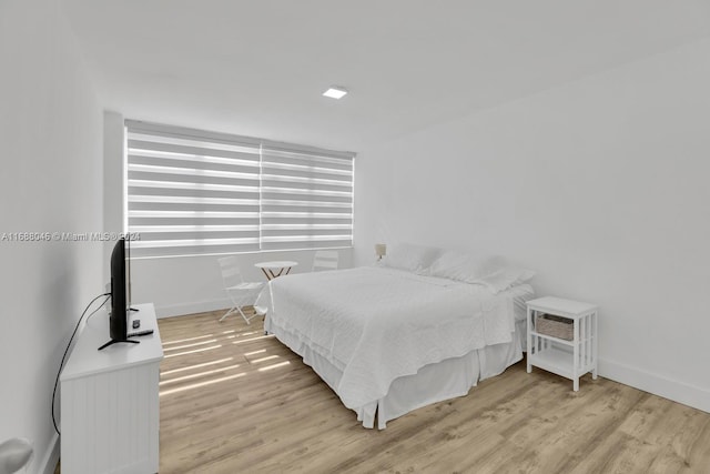 bedroom featuring light wood-type flooring