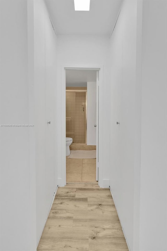 hallway featuring light hardwood / wood-style floors