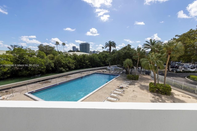 view of swimming pool featuring a patio