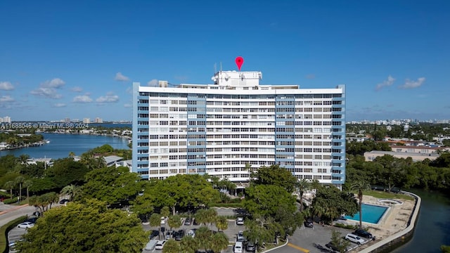 view of building exterior with a water view