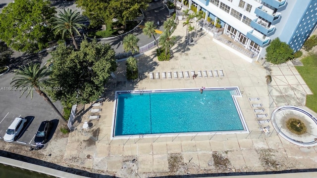 view of pool featuring a patio area