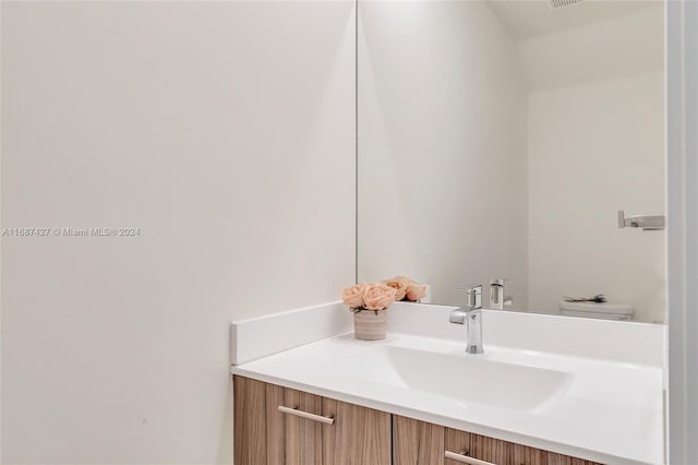 6425 NW 103rd Pl Unit 102, Doral, FL 33178 - bathroom featuring vanity and toilet