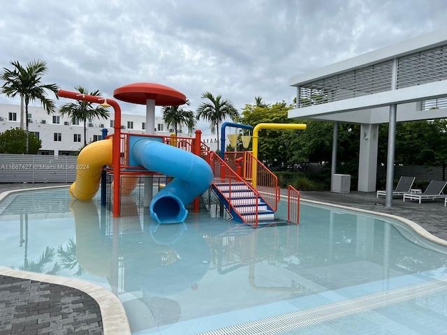 6425 NW 103rd Pl Unit 102, Doral, FL 33178 - community pool featuring a water play area