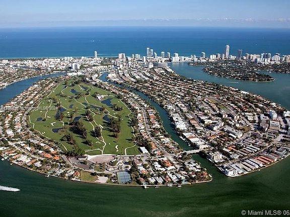 1201 Marseille Dr Unit 17, Miami Beach, FL 33141 - aerial view of property's location featuring a nearby body of water and nearby urban area