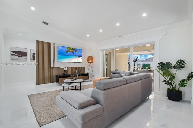 living room featuring crown molding