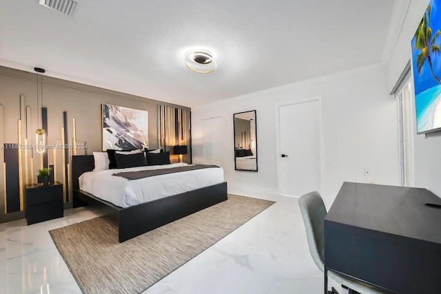 bedroom featuring a textured ceiling and crown molding