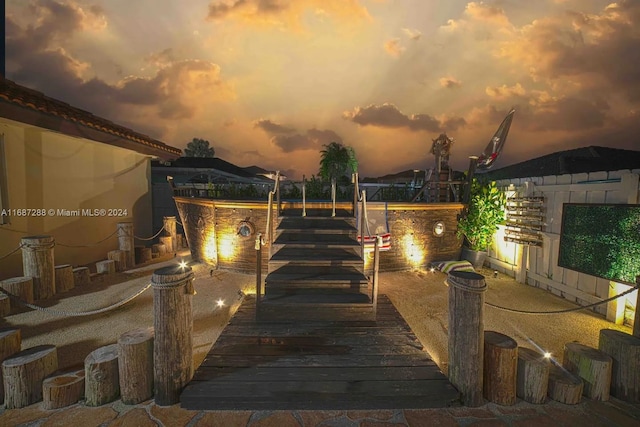 view of patio terrace at dusk