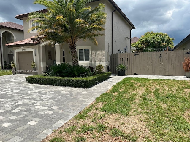 view of front of home with a garage