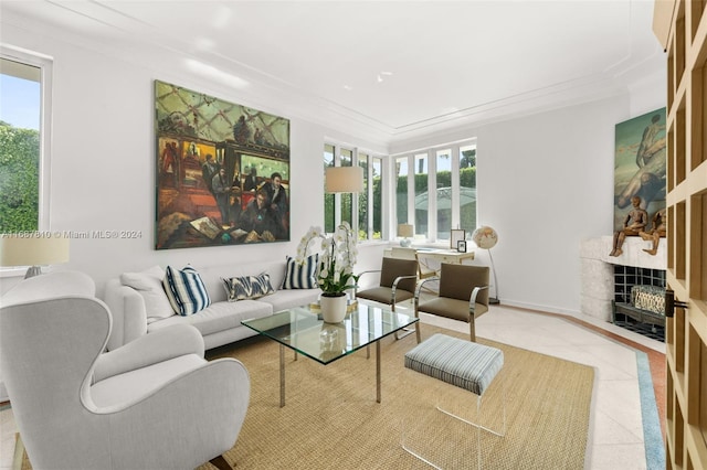 living room featuring light tile patterned flooring, a healthy amount of sunlight, and crown molding