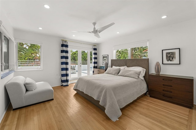 bedroom with light hardwood / wood-style floors and ceiling fan