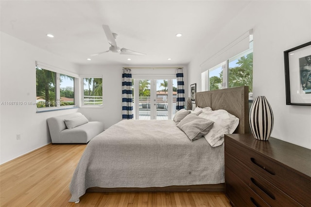 bedroom featuring ceiling fan and light hardwood / wood-style flooring