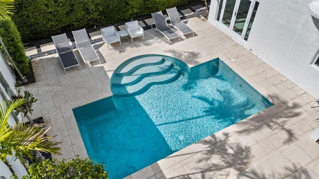 view of pool with a patio area