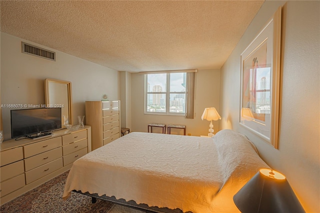 bedroom with a textured ceiling