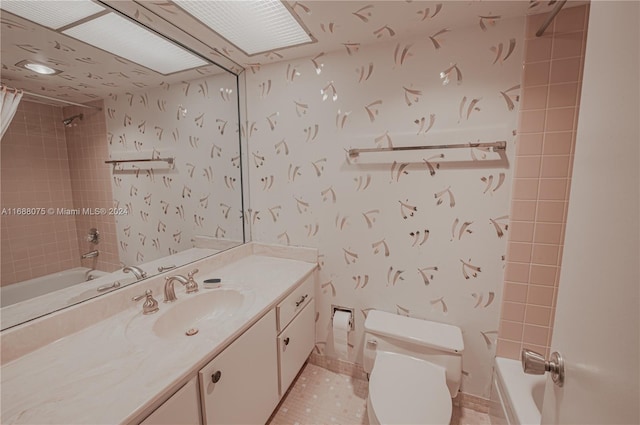 full bathroom featuring vanity, tile patterned floors, toilet, and shower / tub combo with curtain