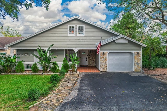 view of front of home with a garage and covered porch