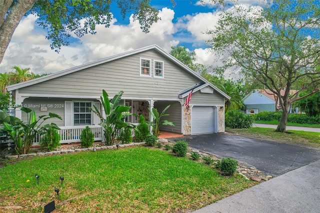 view of front of house featuring a porch and a front yard