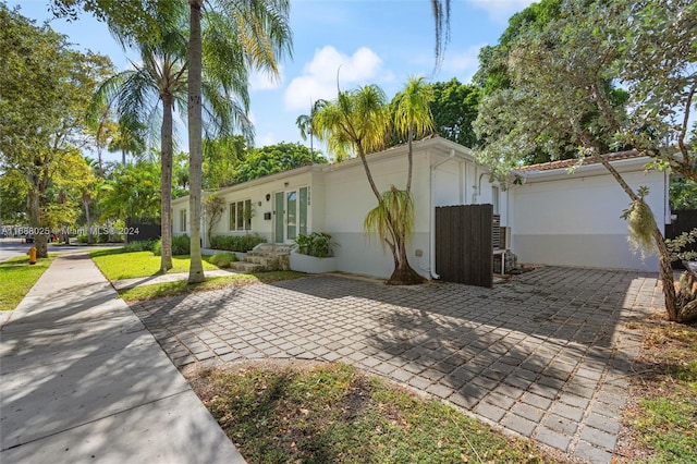 view of front of property featuring a garage