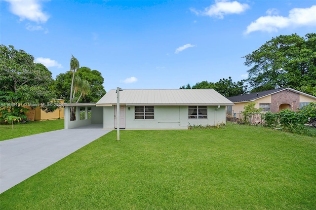 ranch-style house featuring a front yard