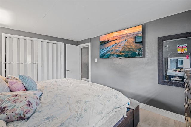 bedroom featuring light hardwood / wood-style flooring