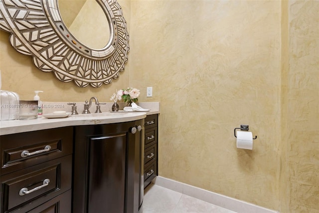 bathroom with vanity and tile patterned floors