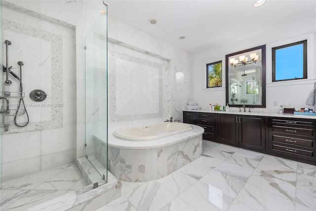 bathroom featuring vanity and plus walk in shower