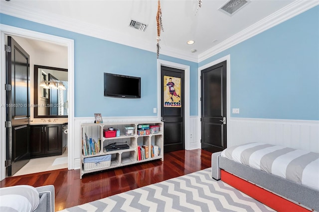 bedroom with dark hardwood / wood-style floors and crown molding